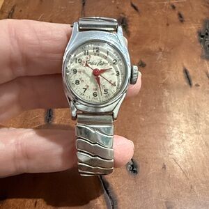 Vintage Space Patrol Silver Watch with Red Accents